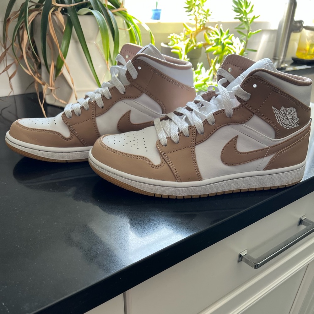 Gently used men’s size 9.5 Jordan 1 tan and white